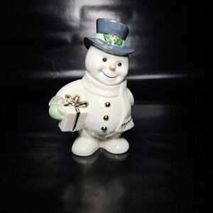Lenox Figurine - Ivory Snowman With a Top Hat Carrying a Gift